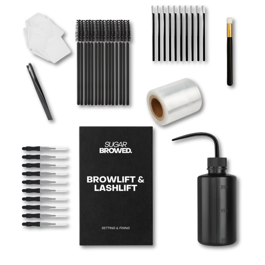 Professional brow lamination starter kit neatly packed in a branded box, including brow & lash lifting solutions, cleansing wipes, remover brushes, lamination brushes, lifting film, water bottle, and precision tweezer. Perfect for brow stylists starting with lamination treatments.