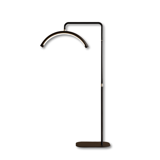 Modern black arched LED UV lamp with stand for brow extension treatments
