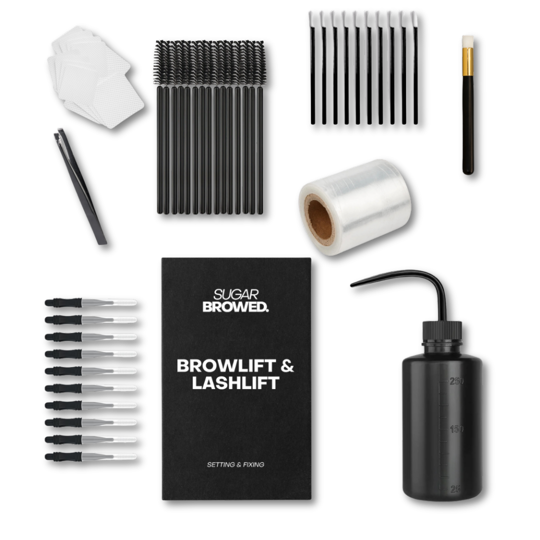Professional brow lamination starter kit neatly packed in a branded box, including brow & lash lifting solutions, cleansing wipes, remover brushes, lamination brushes, lifting film, water bottle, and precision tweezer. Perfect for brow stylists starting with lamination treatments.